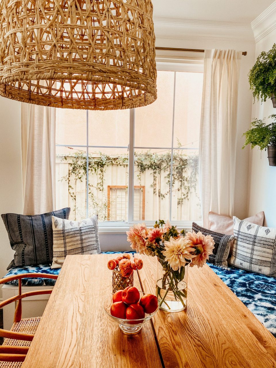 The textured, woven pendant light over the table 