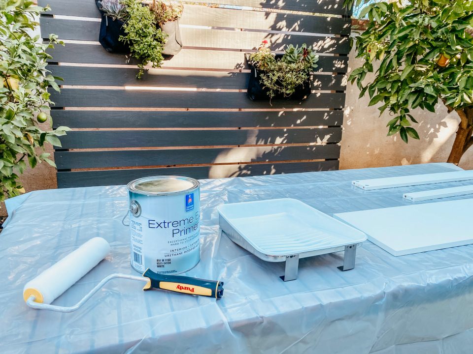 Our work station is all set up outside, with Sherwin-Williams paint and primer