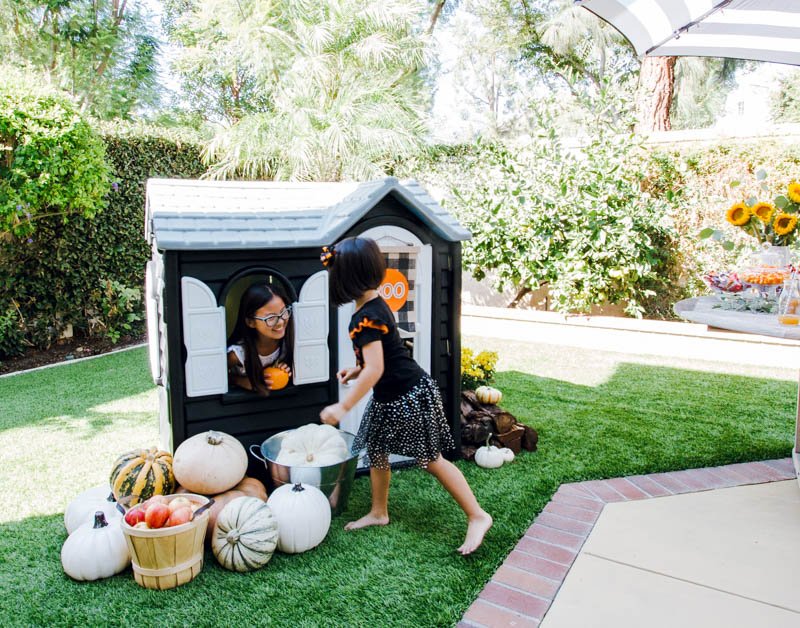 the girls play in the haunted play house