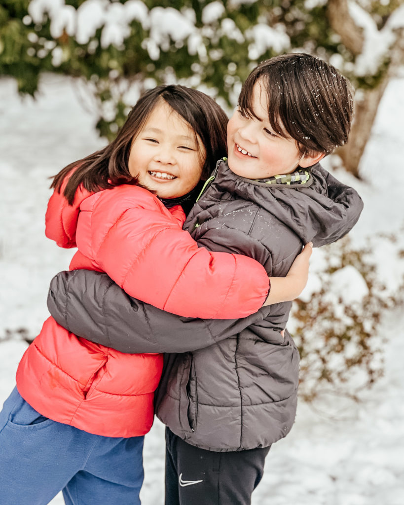 Natalie gives her cousin a hug for Week 4 of the HomeTherapy Challenge!